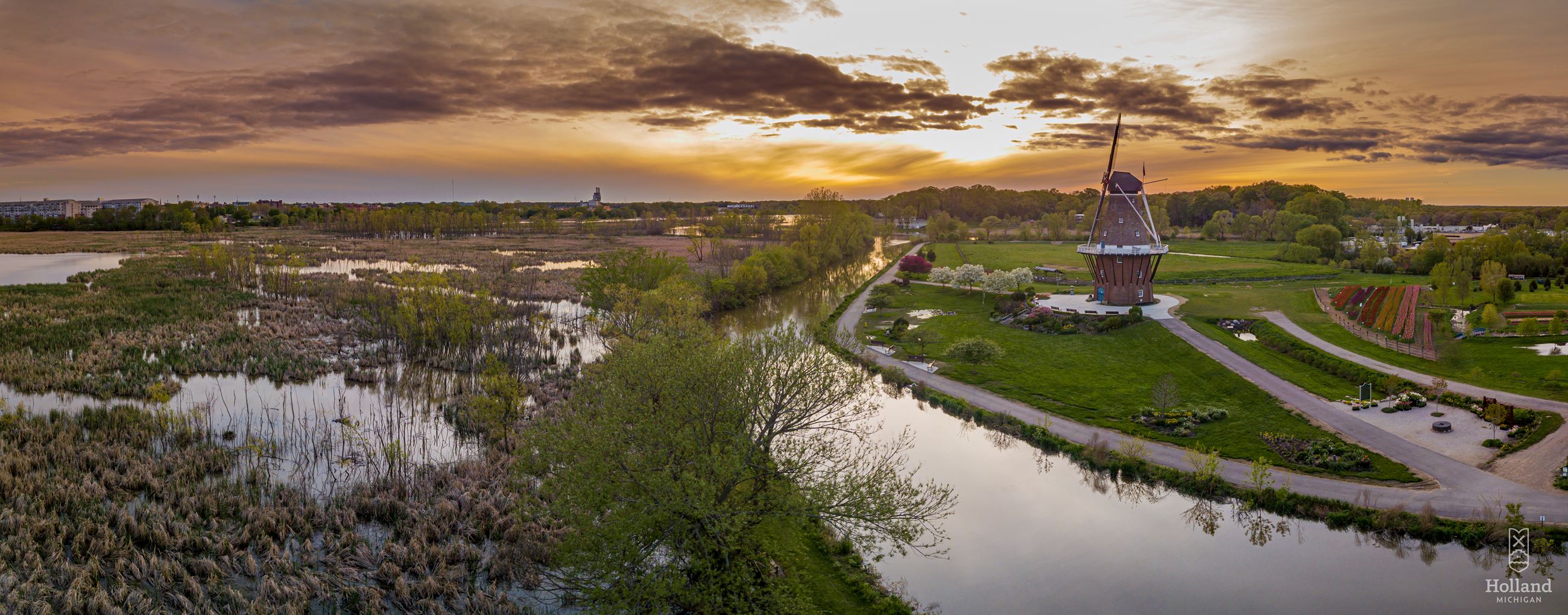 Drone photo at sunset of Windmill, and surrounding grounds with canal