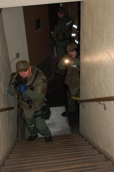 Team Members Manuevering Upstairs