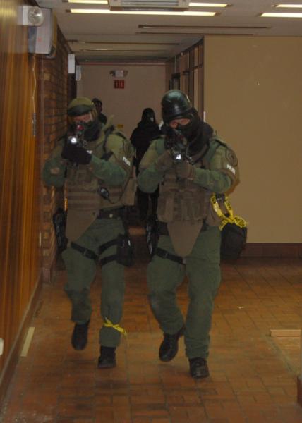 Two Team Members Wearing Masks