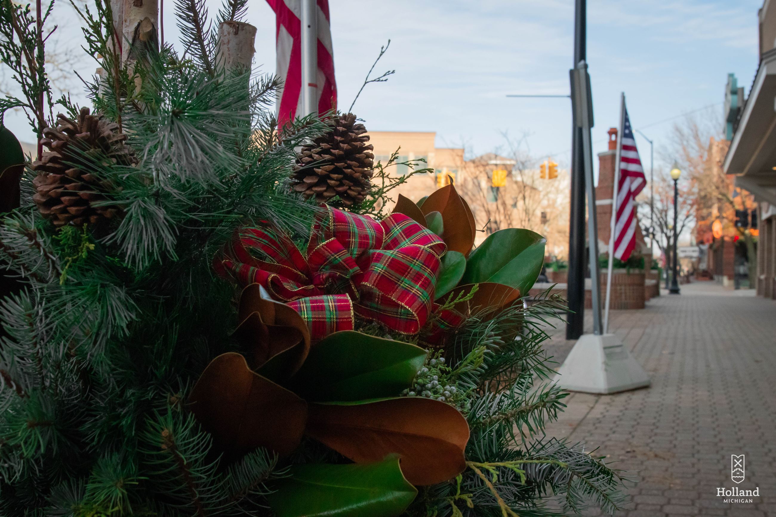 Greenery Holiday decorations with downtown streetscape in the background