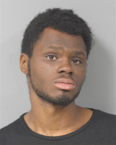 Male subject in booking photo