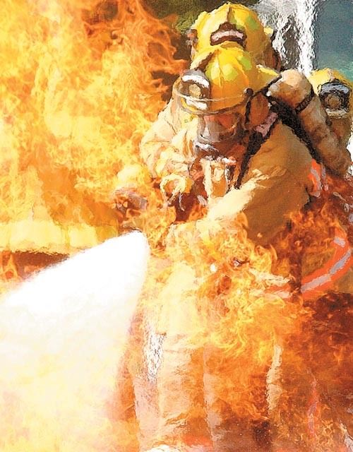 Fire Fighter putting out a fire